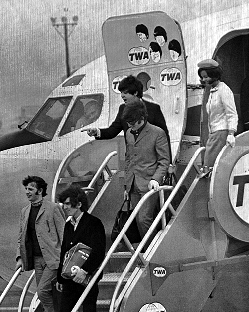 Beatles deplaning at JFK International Airport.