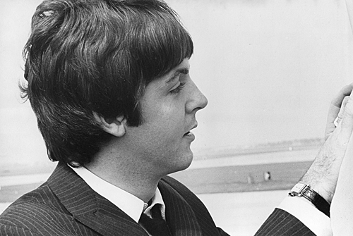 Paul boarding plane in London.